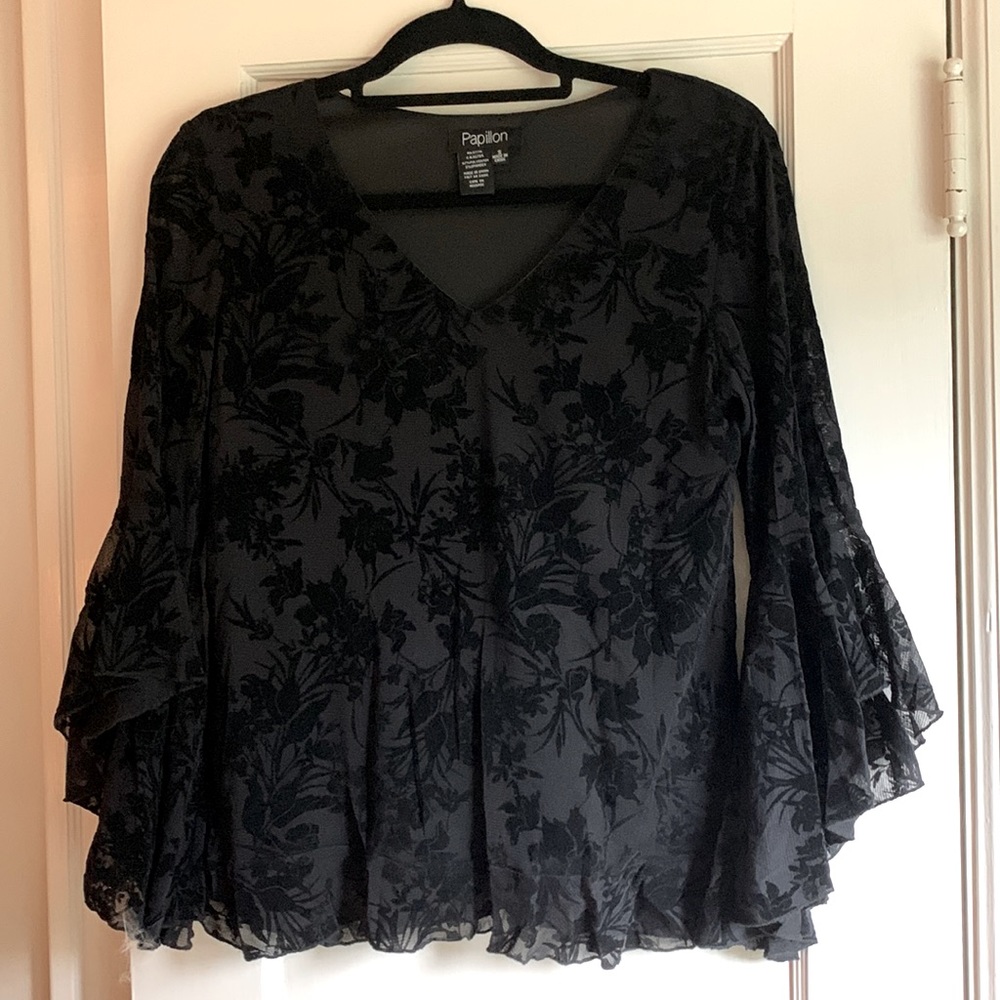 Lacy black Papillon blouse.